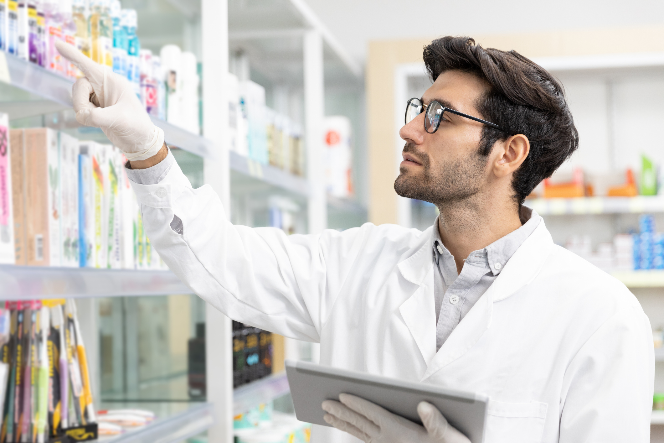 Individual performing a physical inventory audit.